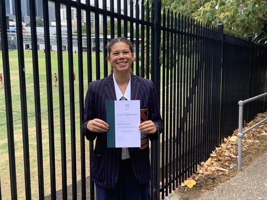 Matilda Elliot (Year 12) with her Change-Maker Award certificate