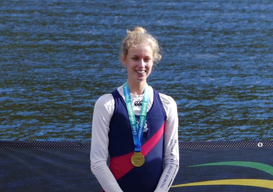 Sophie Malcolm wearing a gold medal